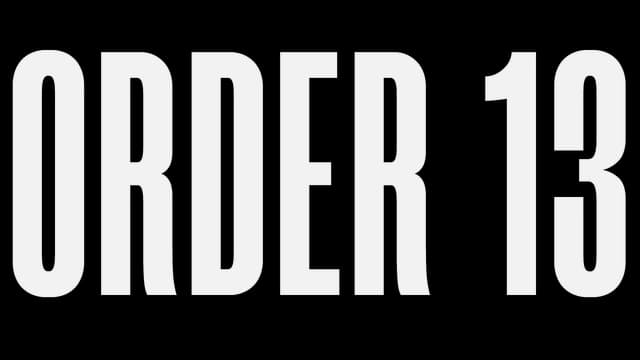 Tall, narrow letters with a bold, horror-themed design.