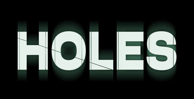 Bold, blocky letters with diagonal lines cutting through, creating a fragmented look.
