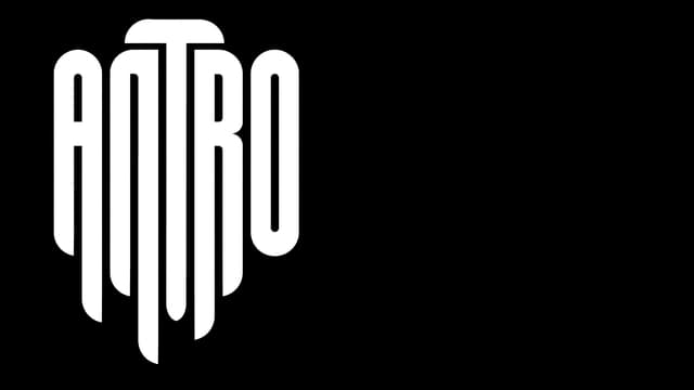 Vertical elongated font with sleek, narrow letters creating a unified drop effect.