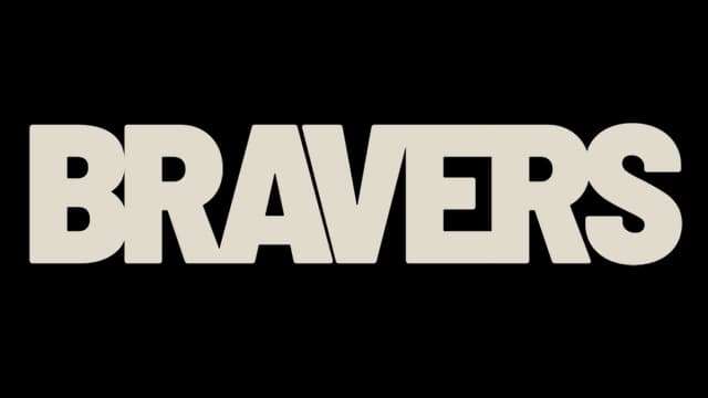 Bold, blocky letters with uniform spacing and solid, light coloring.