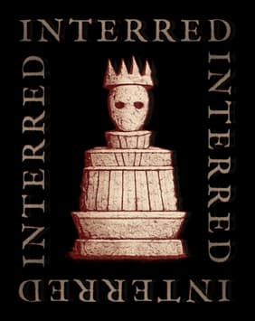 INTERRED: Distressed serif text framing a crowned skull statue, gritty red edge glow.