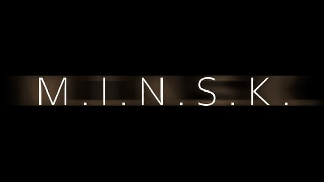 Sleek, angular font with wide spacing on a horizontal orange glow.