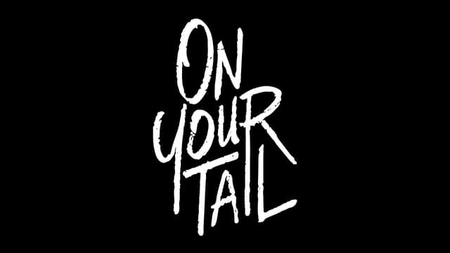 Handwritten-style font with brushstroke texture and tall letters.