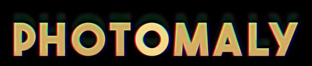 Photomaly: Bold serif caps with VHS chromatic glitch edging and drop shadow.