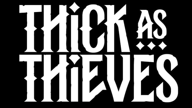 Intricate, sharp serif font with diamond accents between letters.