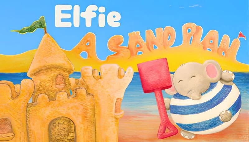 Elfie: Young elephant in striped shirt holds red shovel beside large sandcastle on sunny beach with vibrant blue sea.