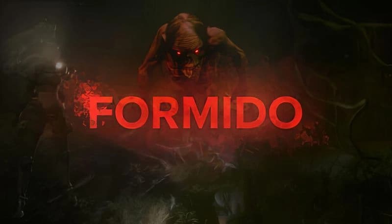 FORMIDO: Sinister creature with glowing red eyes emerges from dark forest setting, creating an eerie, tense atmosphere.