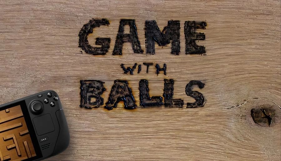 Game With Balls: Wooden surface with black marbles near handheld console showing a maze game, creating an arcade setting.