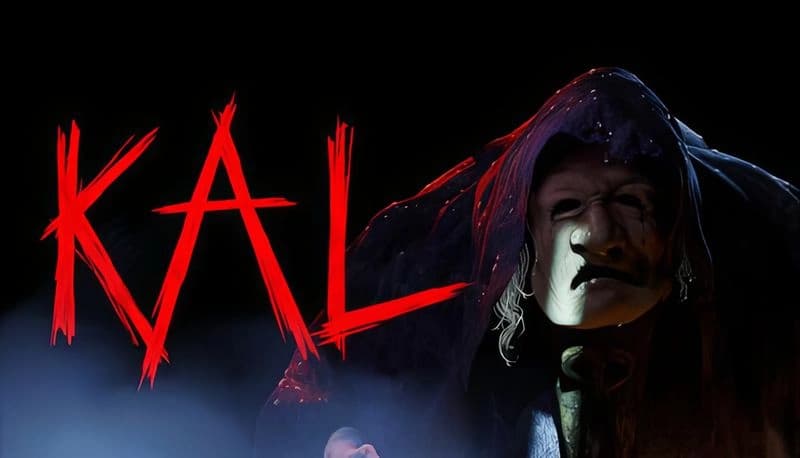 KAL Demo: Hooded figure with a sinister mask and glowing eyes emerges from shadows, creating a mysterious atmosphere.