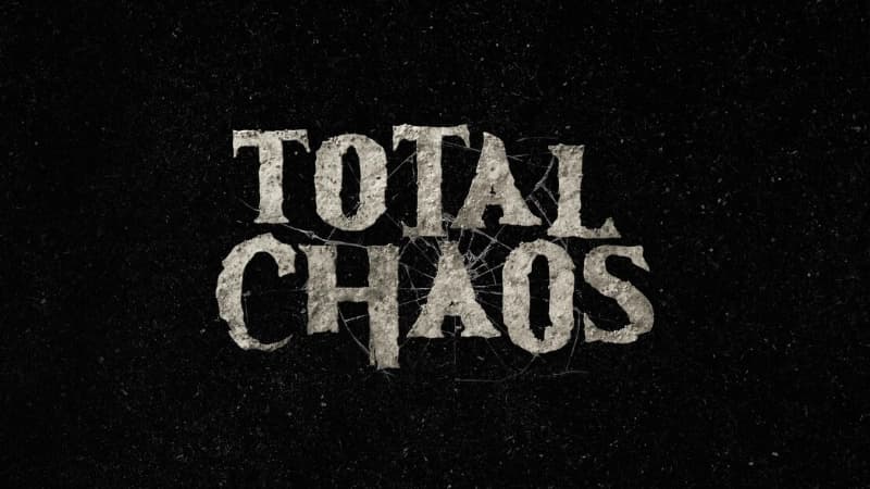 Text reading "TOTAL CHAOS" appears over a black, tar-like background with spiderwebs emerging from the center.