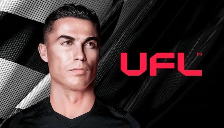 Male athlete with short hair in a black sports jersey stands against a dynamic black and white fabric-textured backdrop.