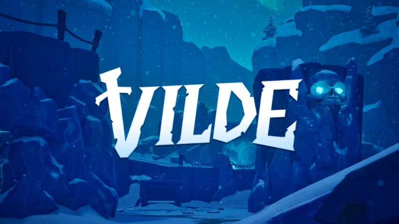 Snowy canyon scene with a stone skull featuring glowing blue eyes, creating an eerie atmosphere.