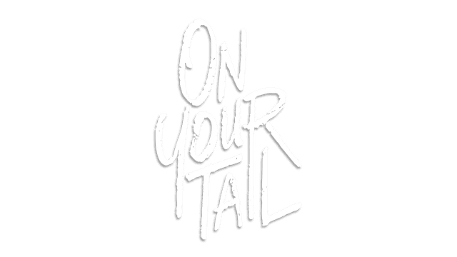 Handwritten-style font with brushstroke texture and tall letters.