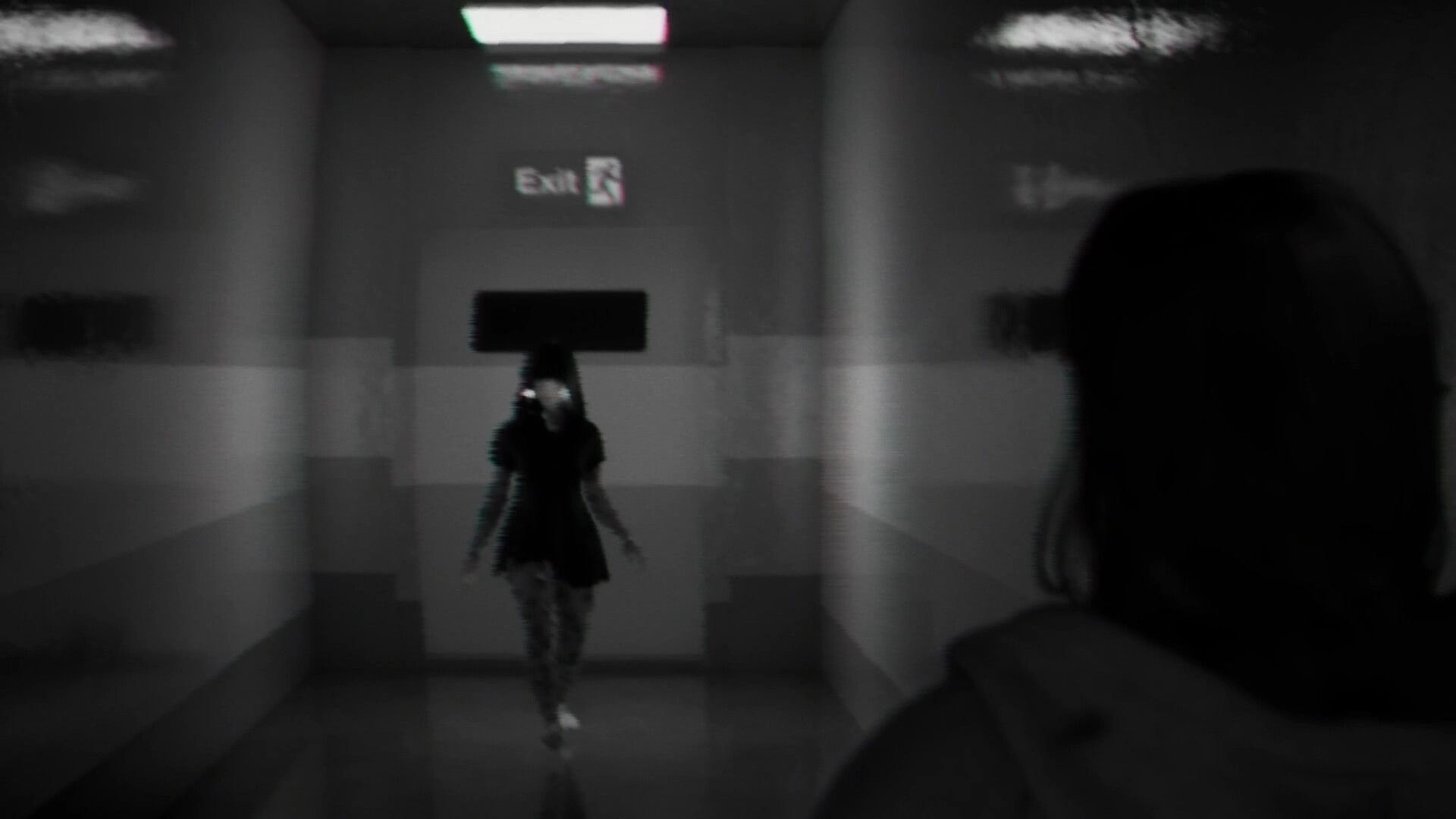BrokenLore: First-person view chasing a girl down a blurry hallway toward an Exit sign in grayscale.