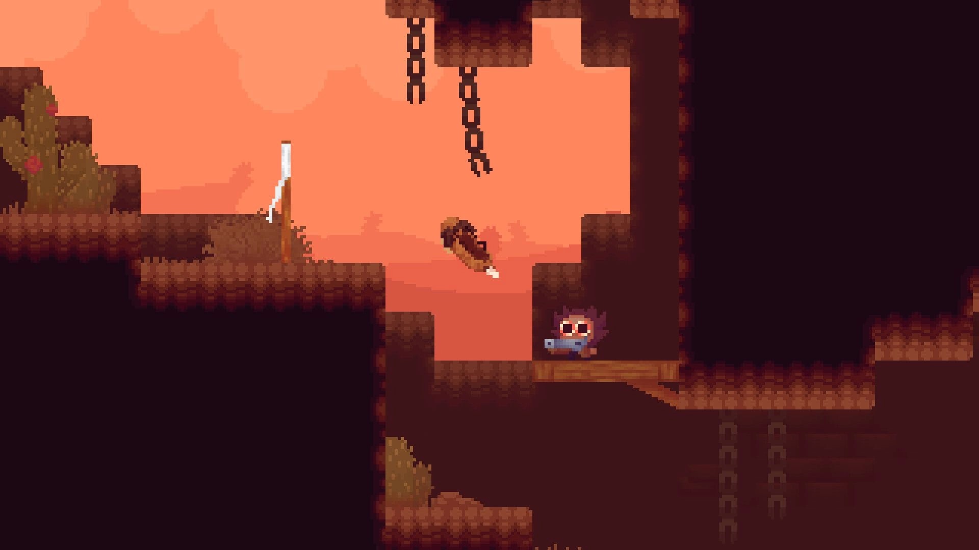 Dry Sea: Pixel hero aims a shotgun at a hovering enemy in a rocky cavern with hanging chains.