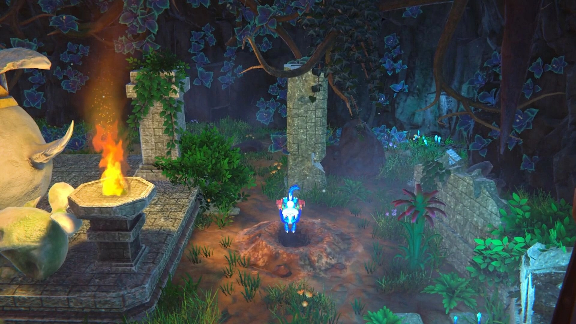 EDEN’S FRONTIER™: Blue-clad hero explores vine-covered ruins beside a burning brazier in a forest glade.