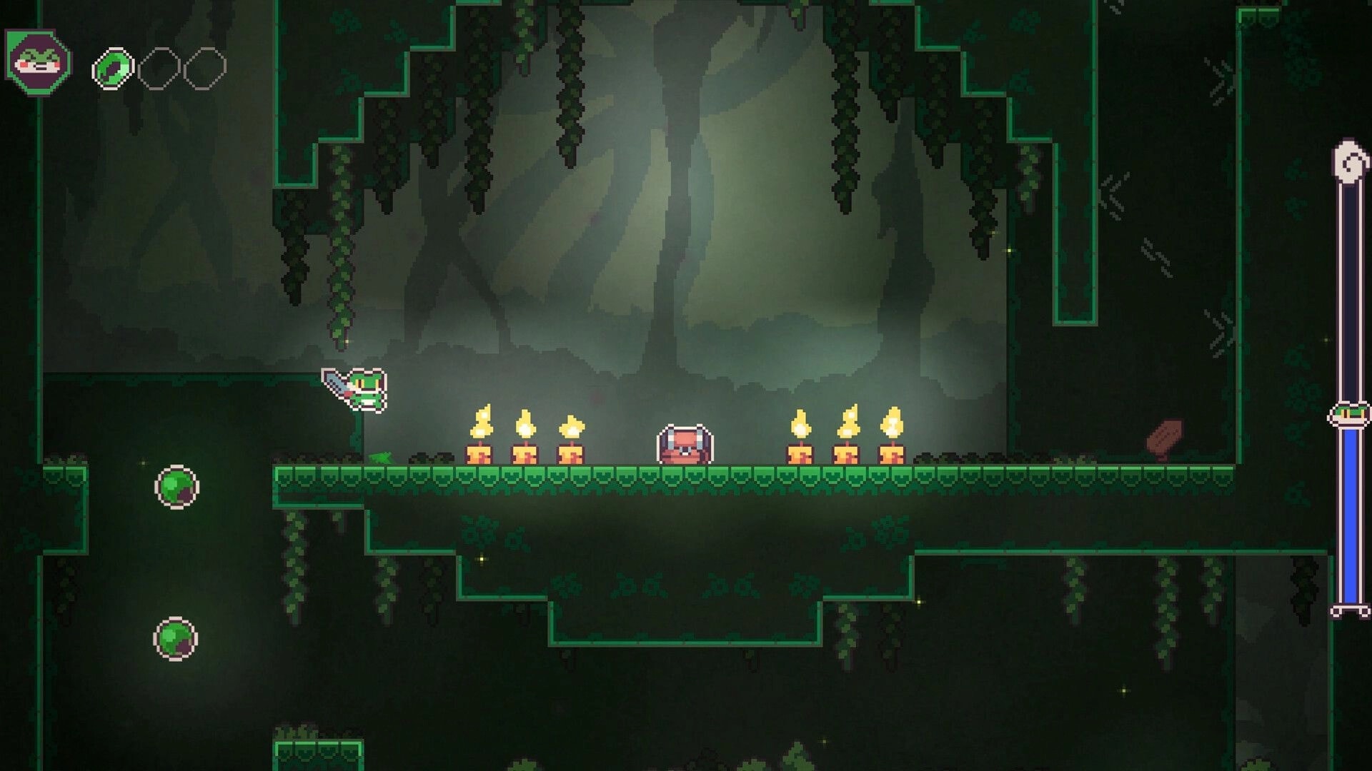 Frog Knight: Frog character jumps near candles and chest in a dark, vine-filled cavern with orbs.