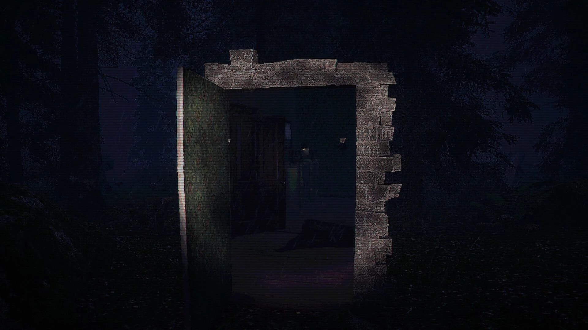 Ghost Scout: Grainy night view of a small stone ruin with a doorway and darkness inside, in woods.