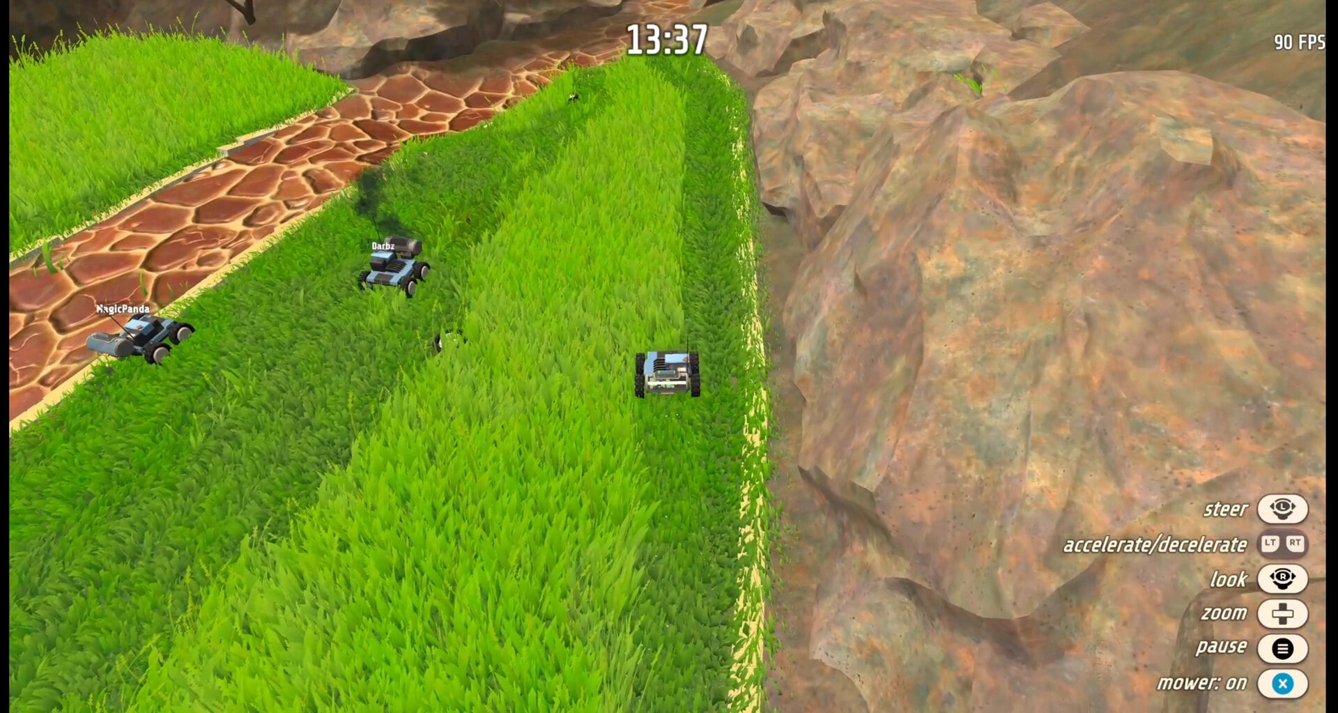 Grass: Two player mowers cut tall grass beside a stone path and cliff, timer 13:37 UI.