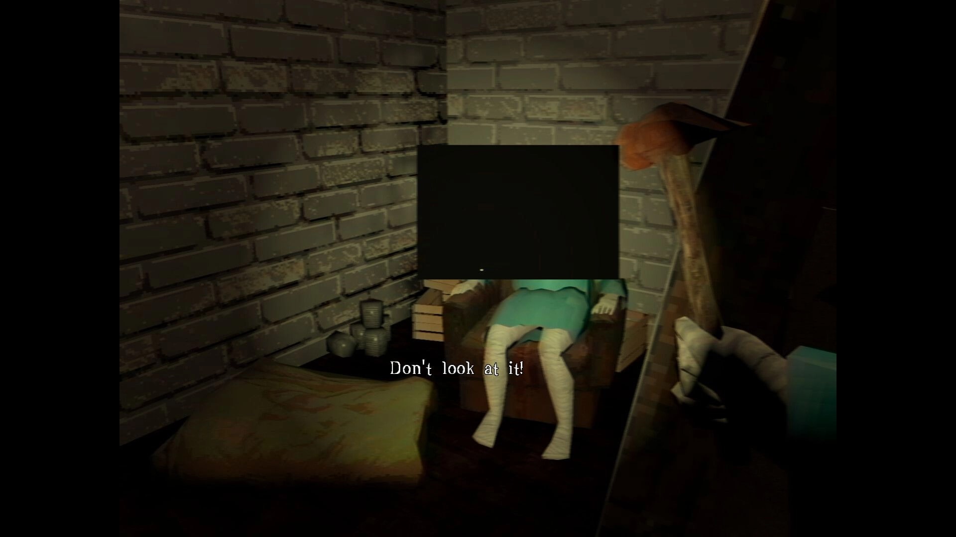 It Breathes: Warning text “Don’t look at it!” over a slumped doll in a brick storage room.