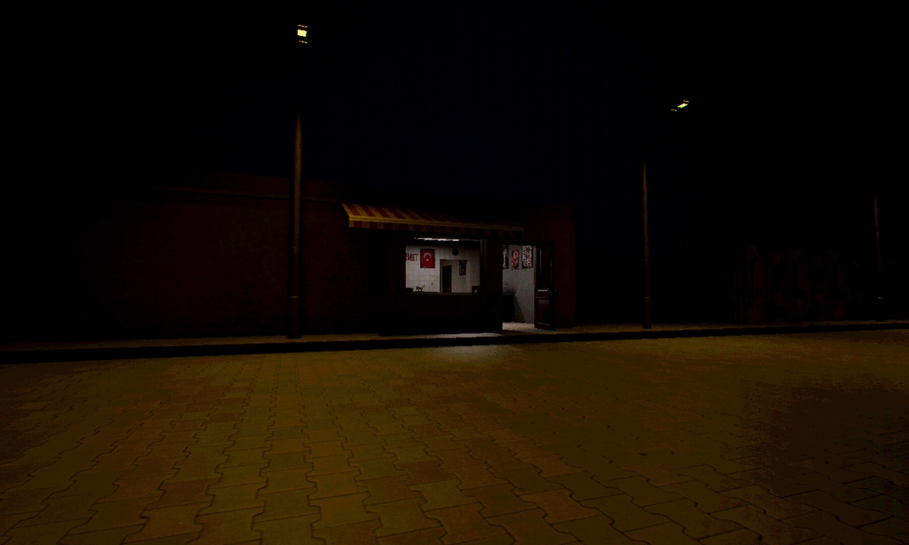 KASAP: Empty street facing a dim butcher shop entrance under streetlights in the dark night.