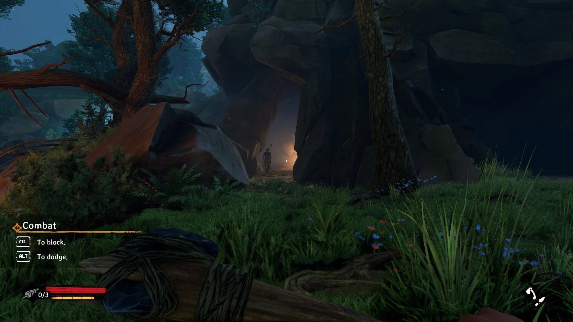 Kiipluu: Combat tutorial HUD as Kiipluu crouches in grass facing cave entrance in forest rocks.