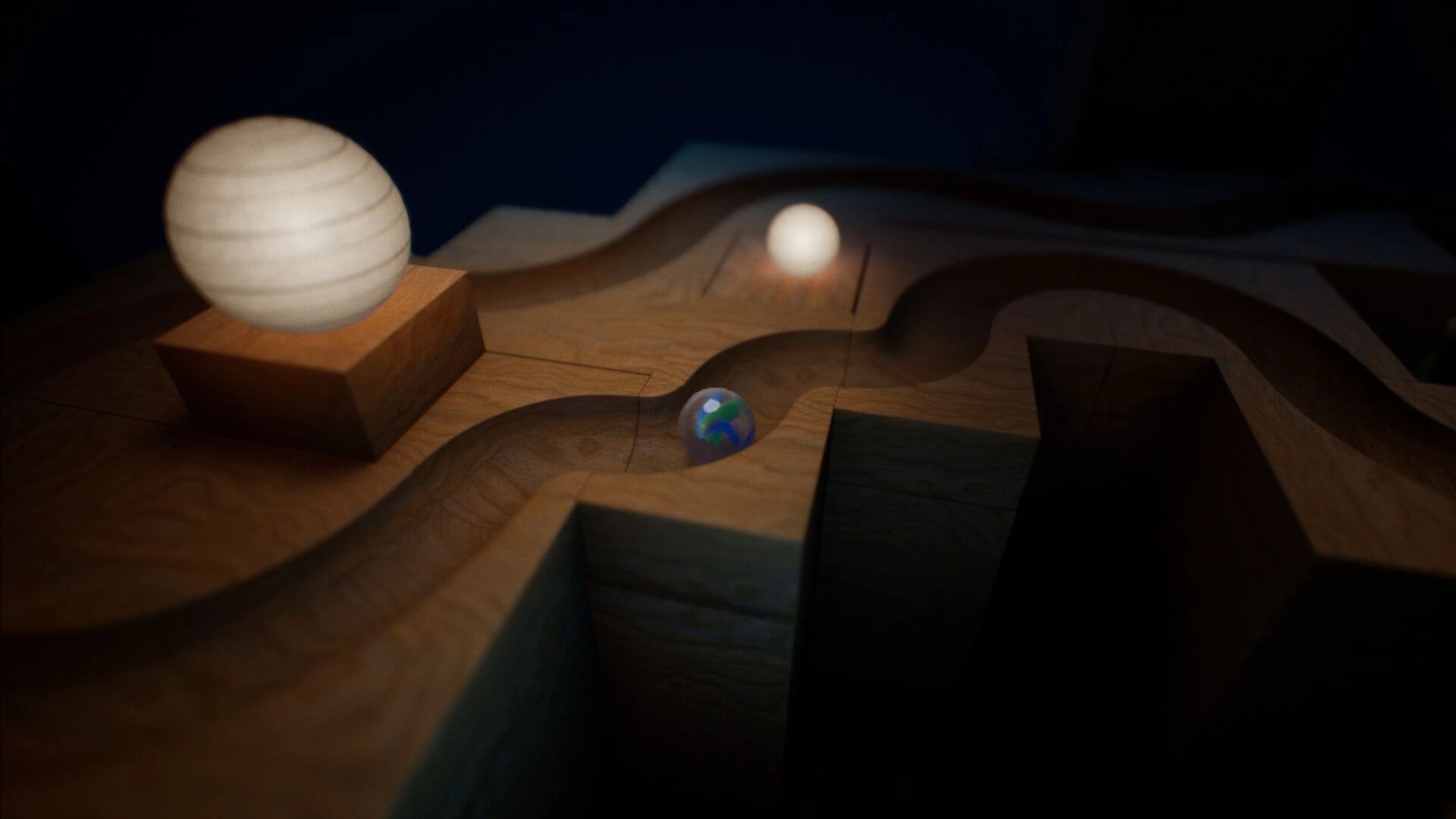 Marblearium: Marble rolling along carved wooden track beside a pedestal sphere in dim lighting.