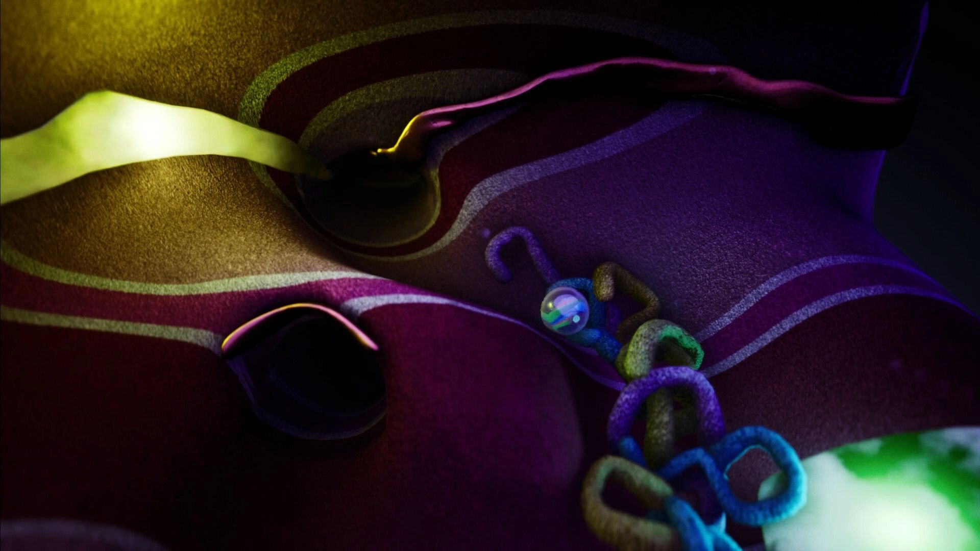 Marblearium: Marble resting near colorful rope loops on a wavy, neon-lit track in dark terrain.