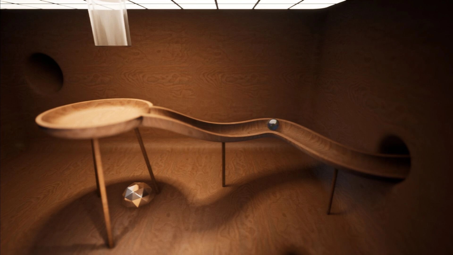 Marblearium: Blue marble rolling along a wavy wooden track inside a softly lit circular chamber.