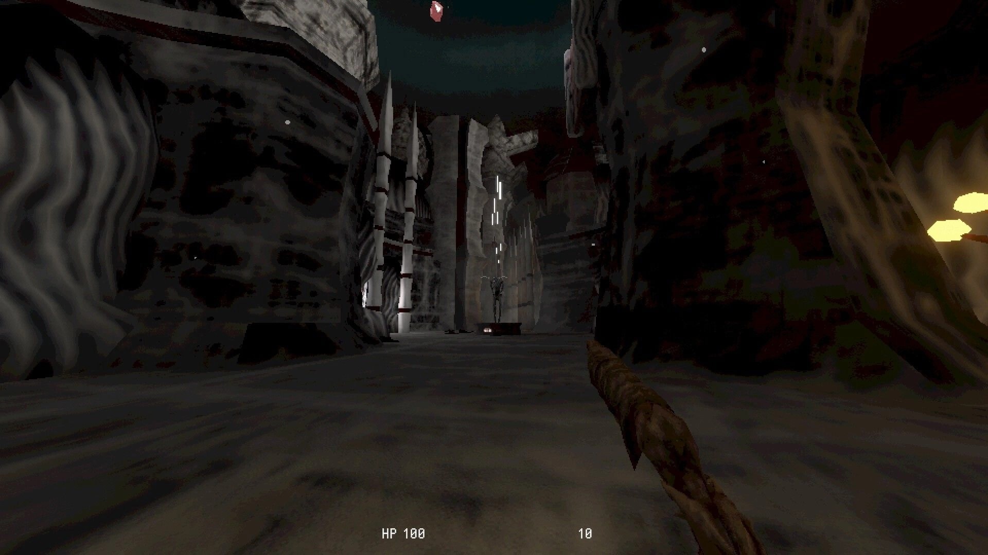 Meat Engine: First-person view holding a fleshy weapon in a dark biomechanical corridor with HP HUD.
