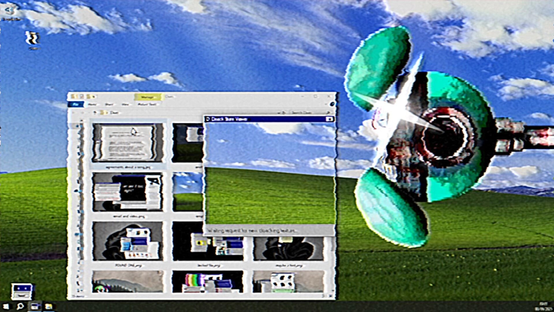 My Helpers: Glitched desktop with photo viewer and floating green propeller over Windows XP wallpaper.