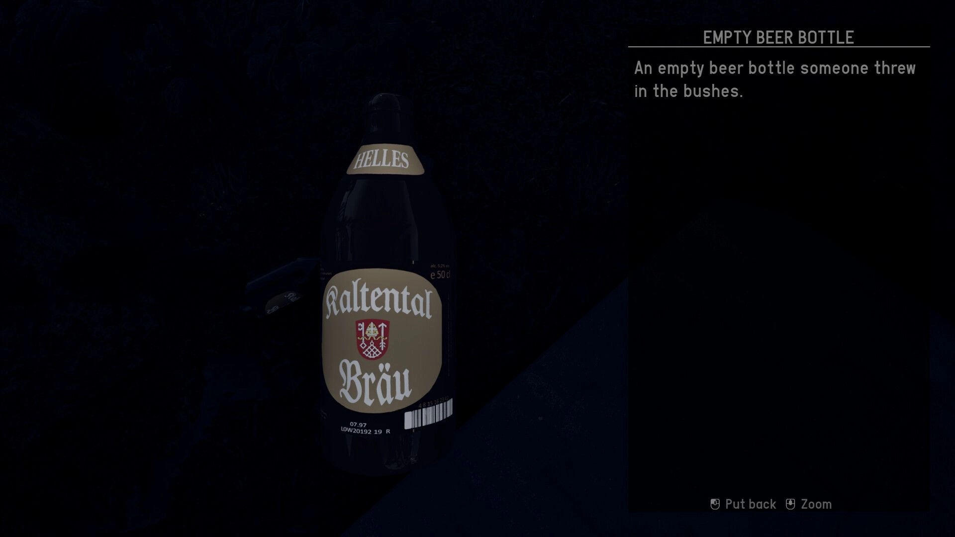 Nachtschicht: Close-up of an empty beer bottle with label in dark environment, text describes its state