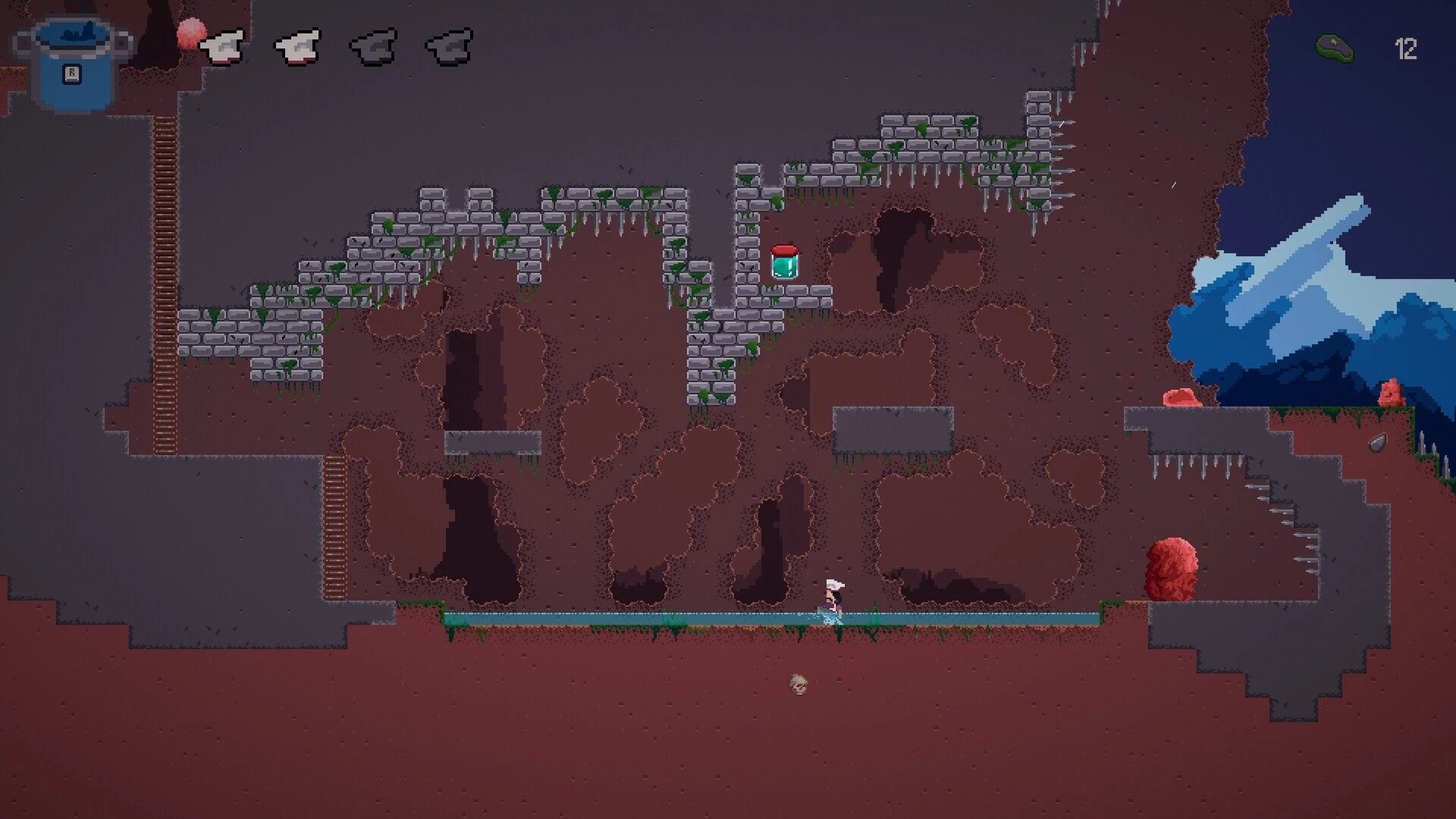 Pablo’s Journey: Pablo runs through a rocky cave level with ladders, spikes, and key counter UI.