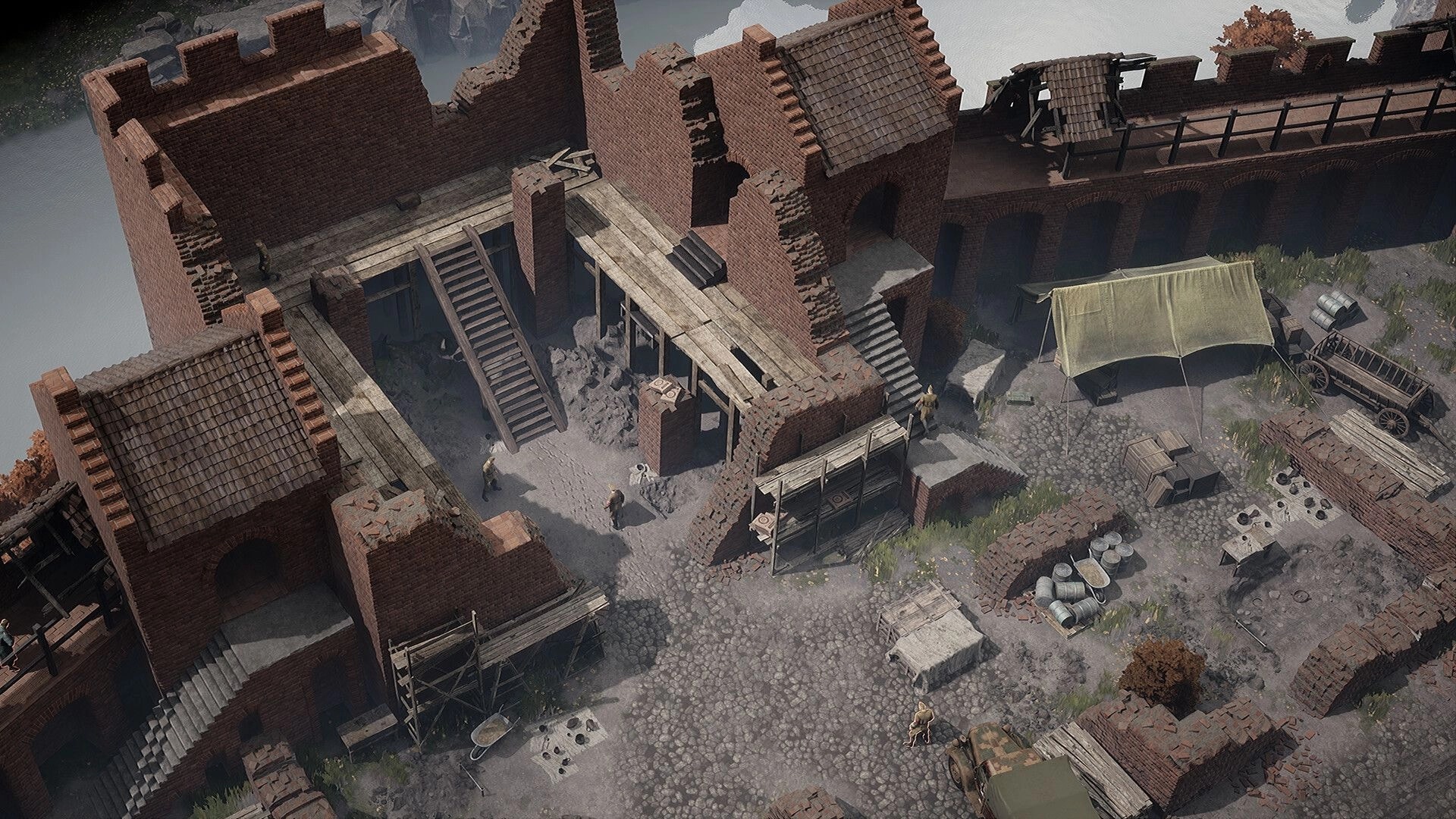 Red Recon: Isometric view of soldiers in a ruined brick fort courtyard with scaffolds and tent camp.