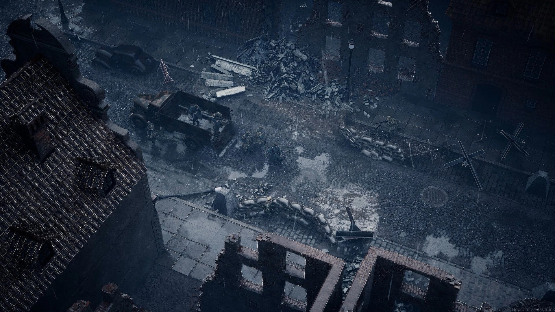 Red Recon: Scouts move past a truck and sandbag barricades in a bombed-out city street at night.