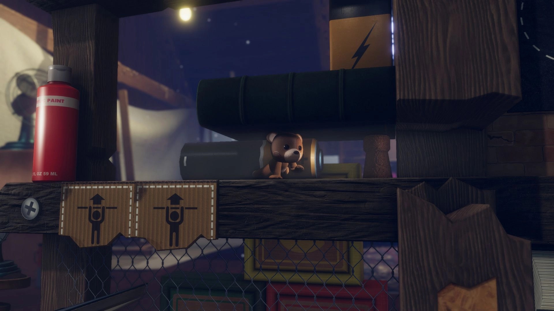Restitched: Small stuffed bear crawls through stacked boxes and flashlights in a dim workshop platformer.
