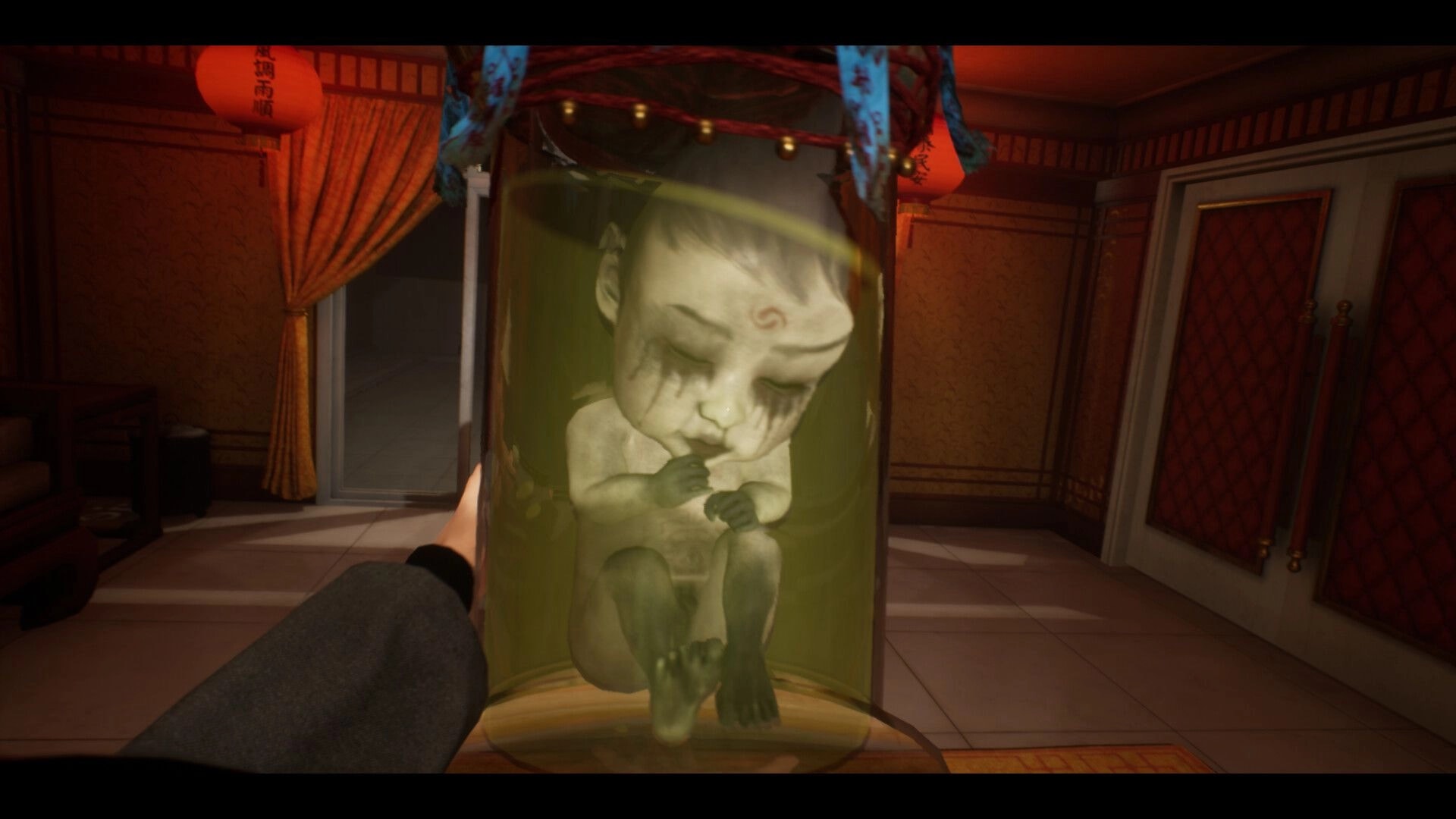 SUFFOCATE: Player holds jar with eerie baby in ornate room with red lanterns and draped curtains.