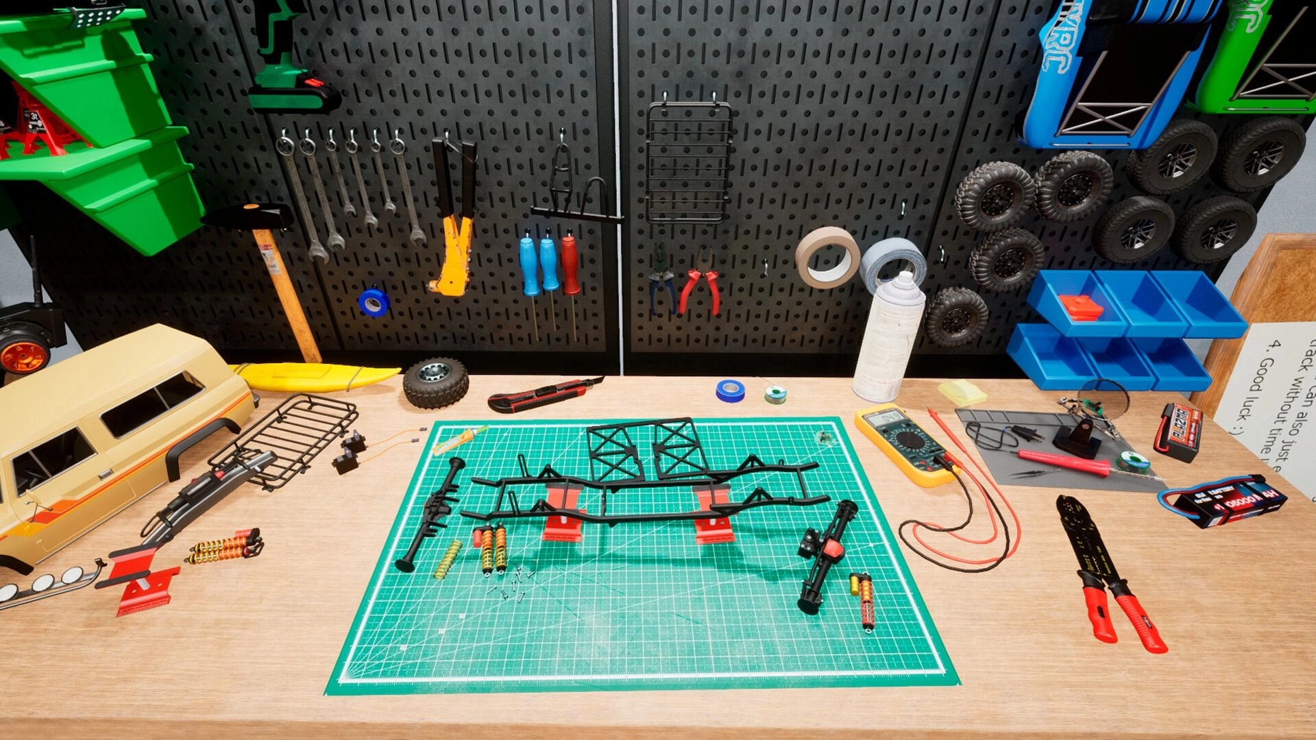 TrophyRC: RC crawler chassis assembly on workbench with tools, tires, and parts on pegboard wall.