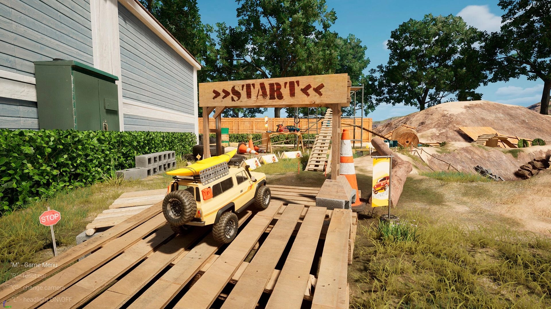 TrophyRC: Off-road RC truck climbs wooden ramp under START gate in backyard obstacle course with cones.
