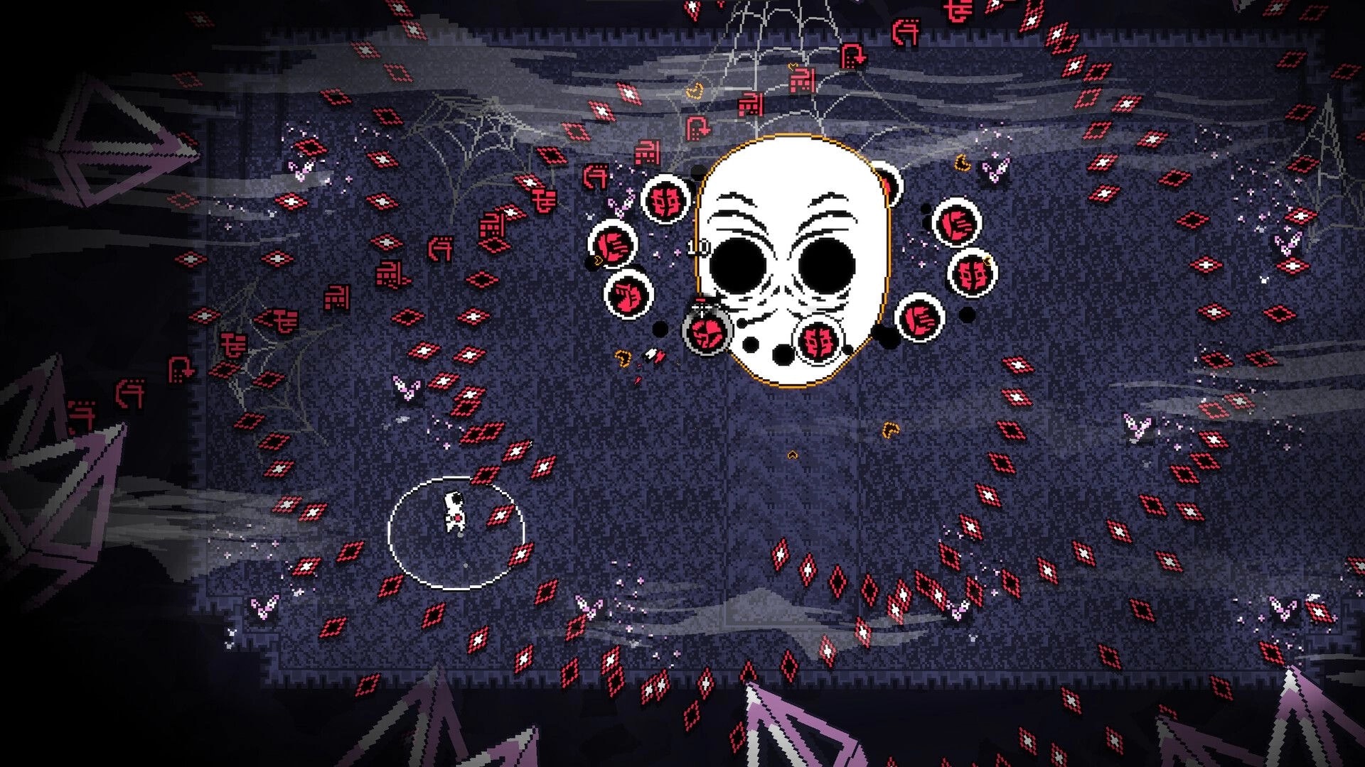 VOIDFACE: Player dodges red bullet patterns around a giant skull boss in a dark stone arena chamber.