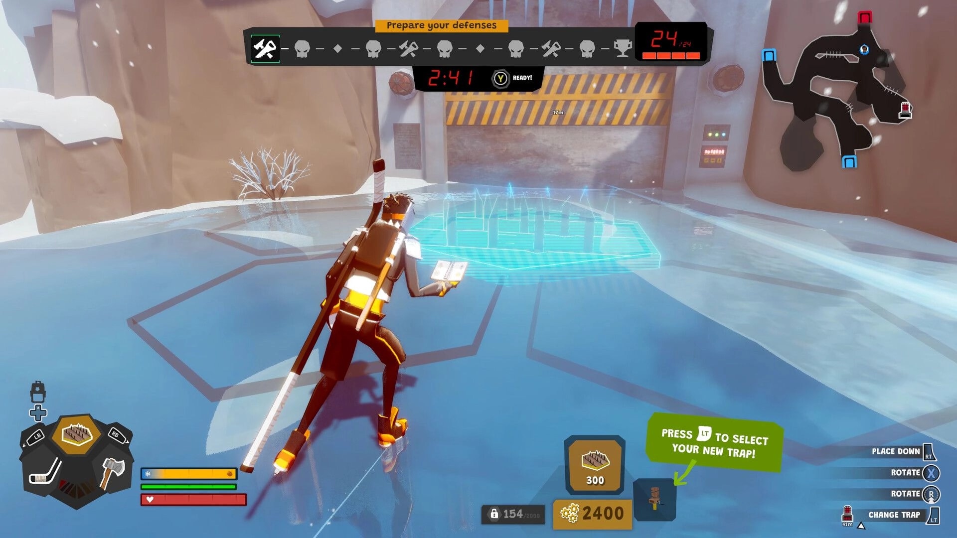 Wild Ice: Player placing a trap blueprint on ice rink before a sealed bunker door in snow canyon.