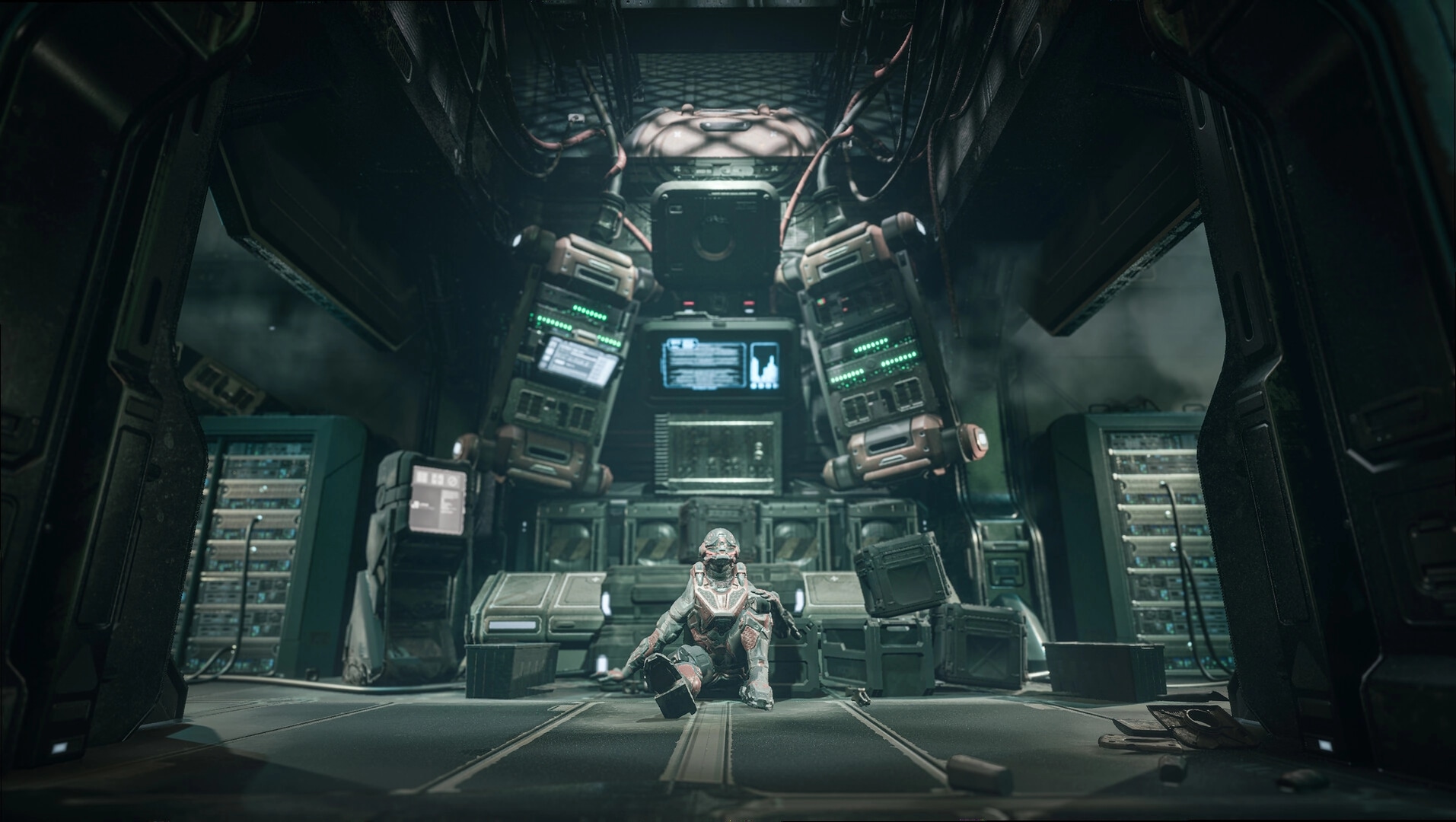 14: Armored astronaut sits on hangar floor amid cargo crates and glowing server racks inside ship.