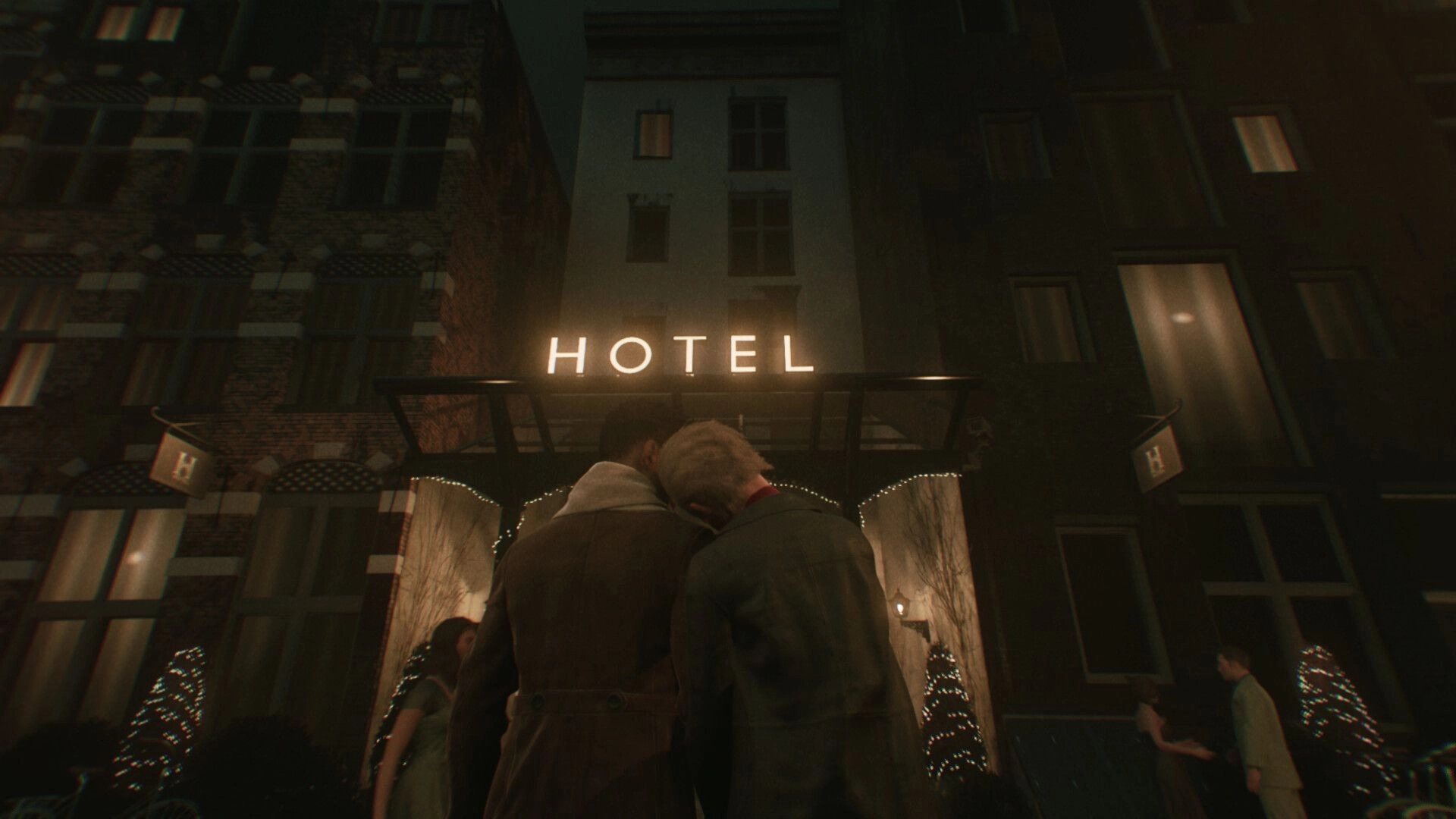 1666: Two men stand close beneath a glowing HOTEL sign outside a tall building at night.