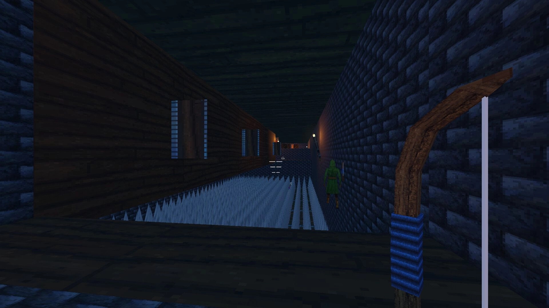 2 Bows 1 Arrow: Player navigates dark stone corridor with spikes, bow visible in first-person view.