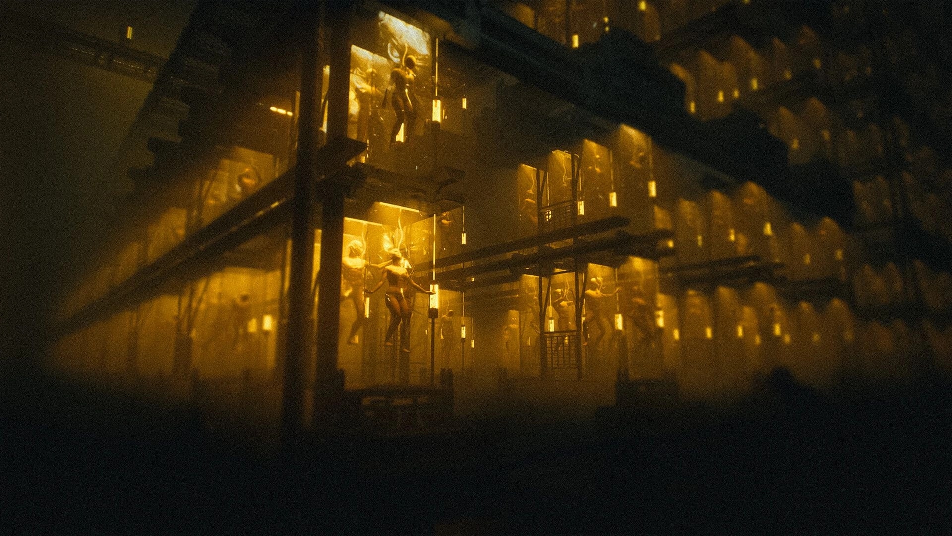 4: Rows of glowing glass pods holding human figures in a vast, dim industrial facility corridor.
