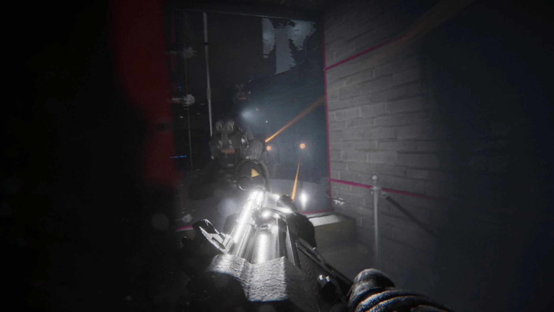 A.A.U. Black Site: First-person combat with enemy in dimly lit corridor, weapon firing in action