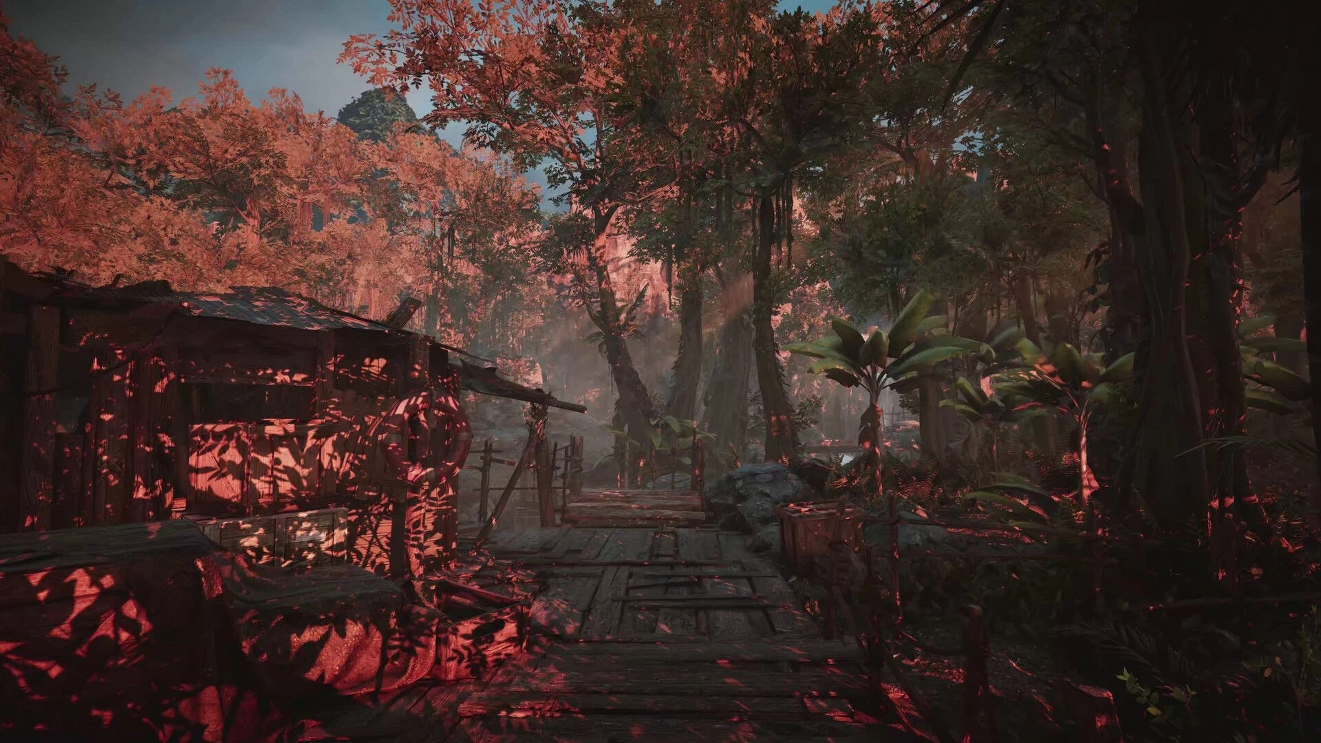 Amerzone: Wooden bridge leading through dense jungle with red foliage and sunlight filtering through trees