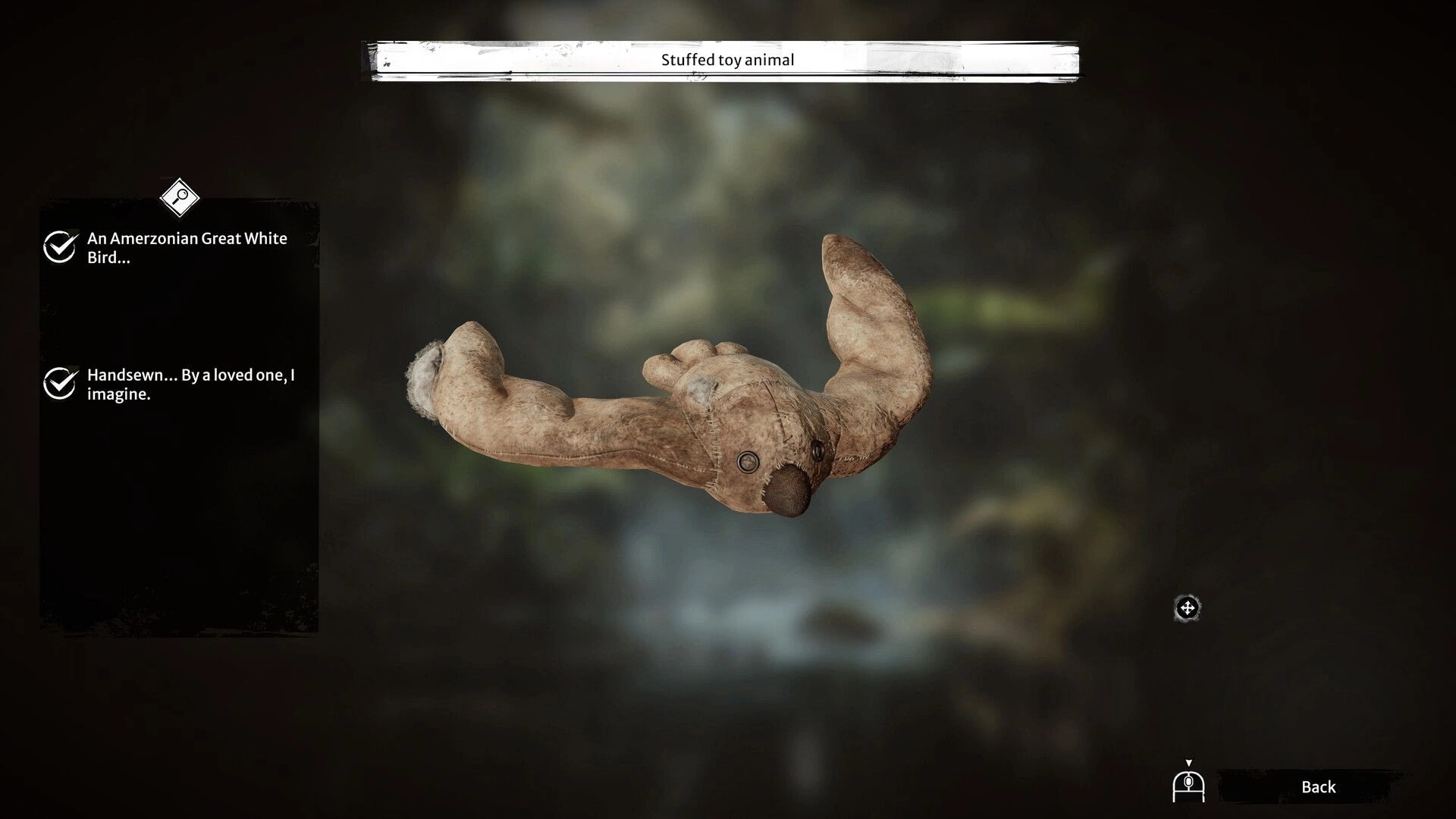 Amerzone: Examining a stuffed toy animal resembling a Great White Bird in a detailed inventory view.