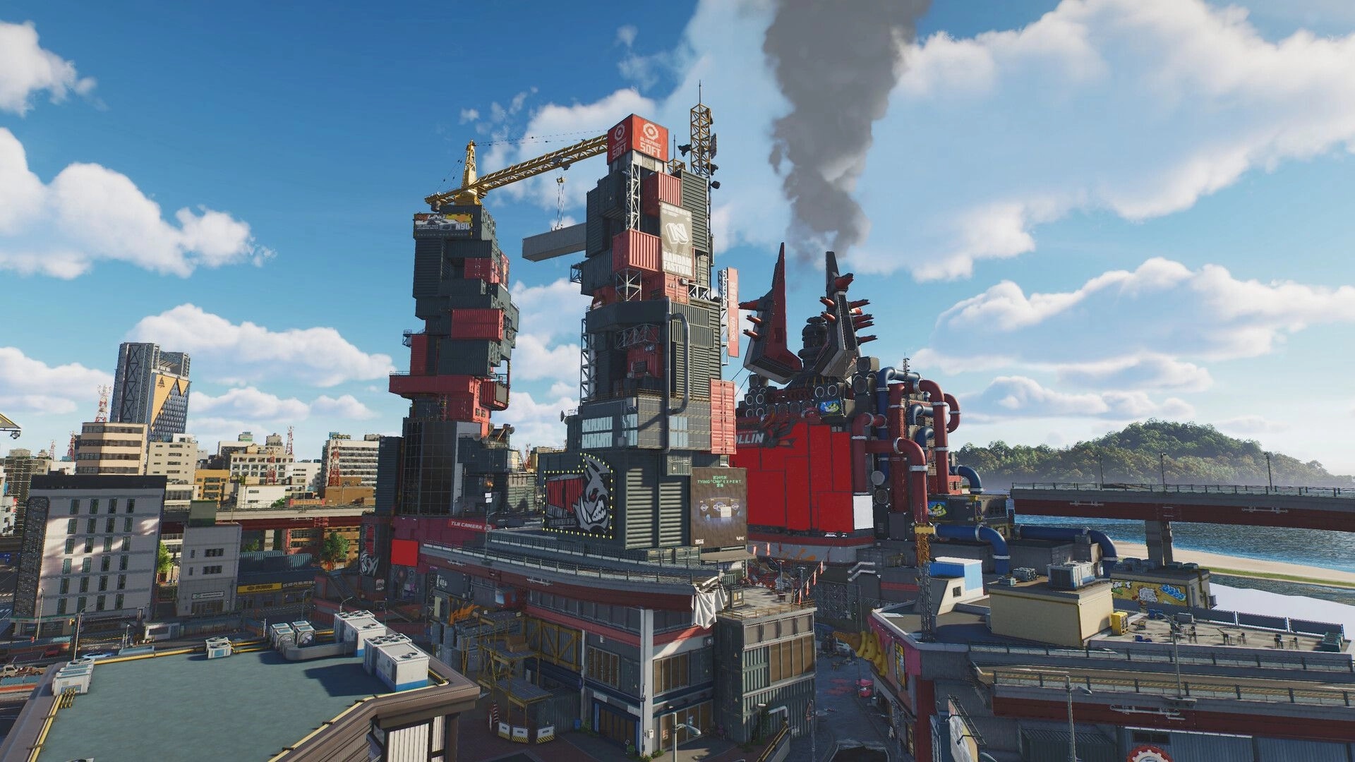 ANANTA: Industrial waterfront district with stacked container towers, cranes, pipes, and smoke plume under blue sky.