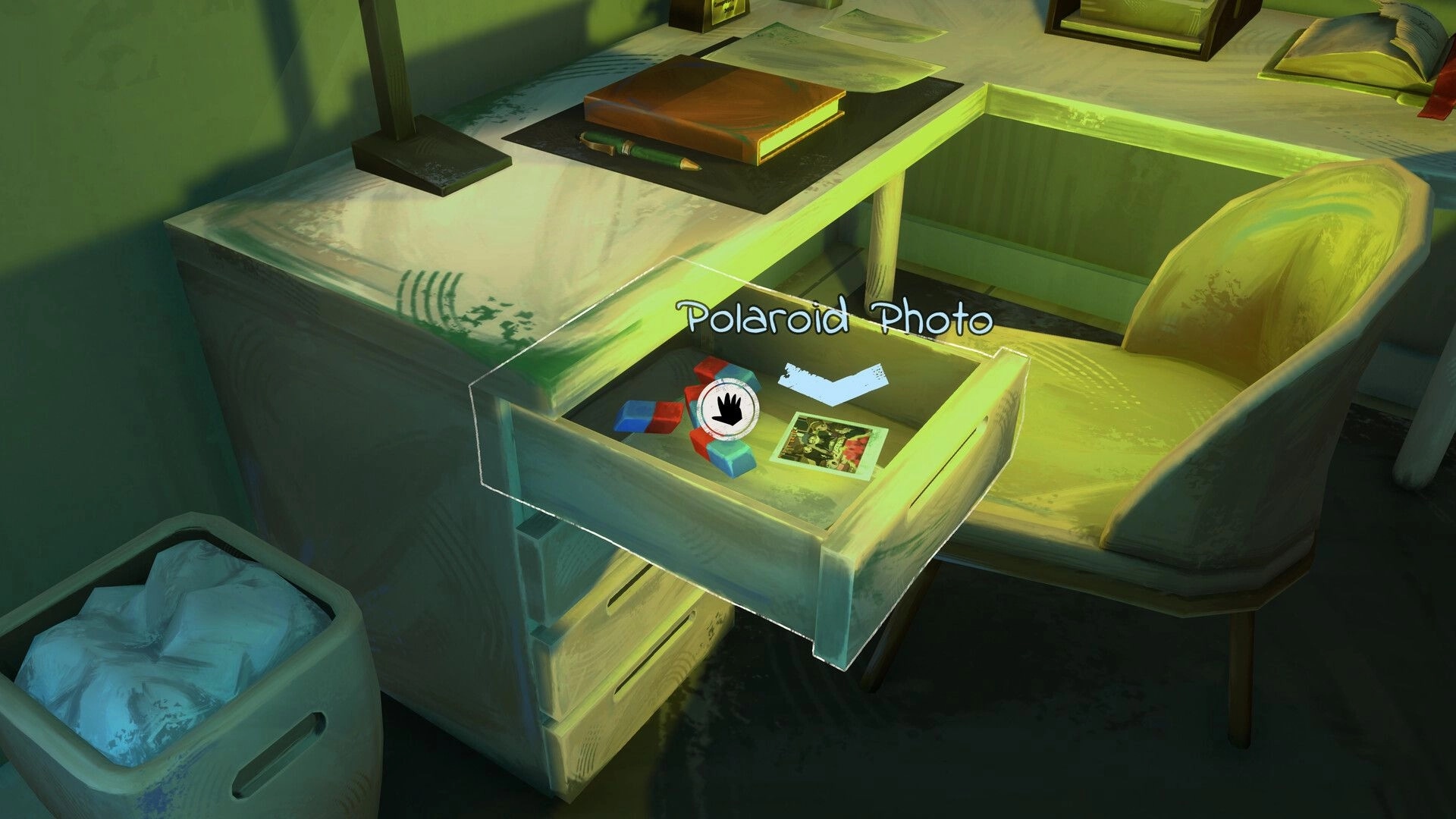 Apple Crumble: Open desk drawer highlighted to pick up Polaroid photo in a green-lit bedroom study.